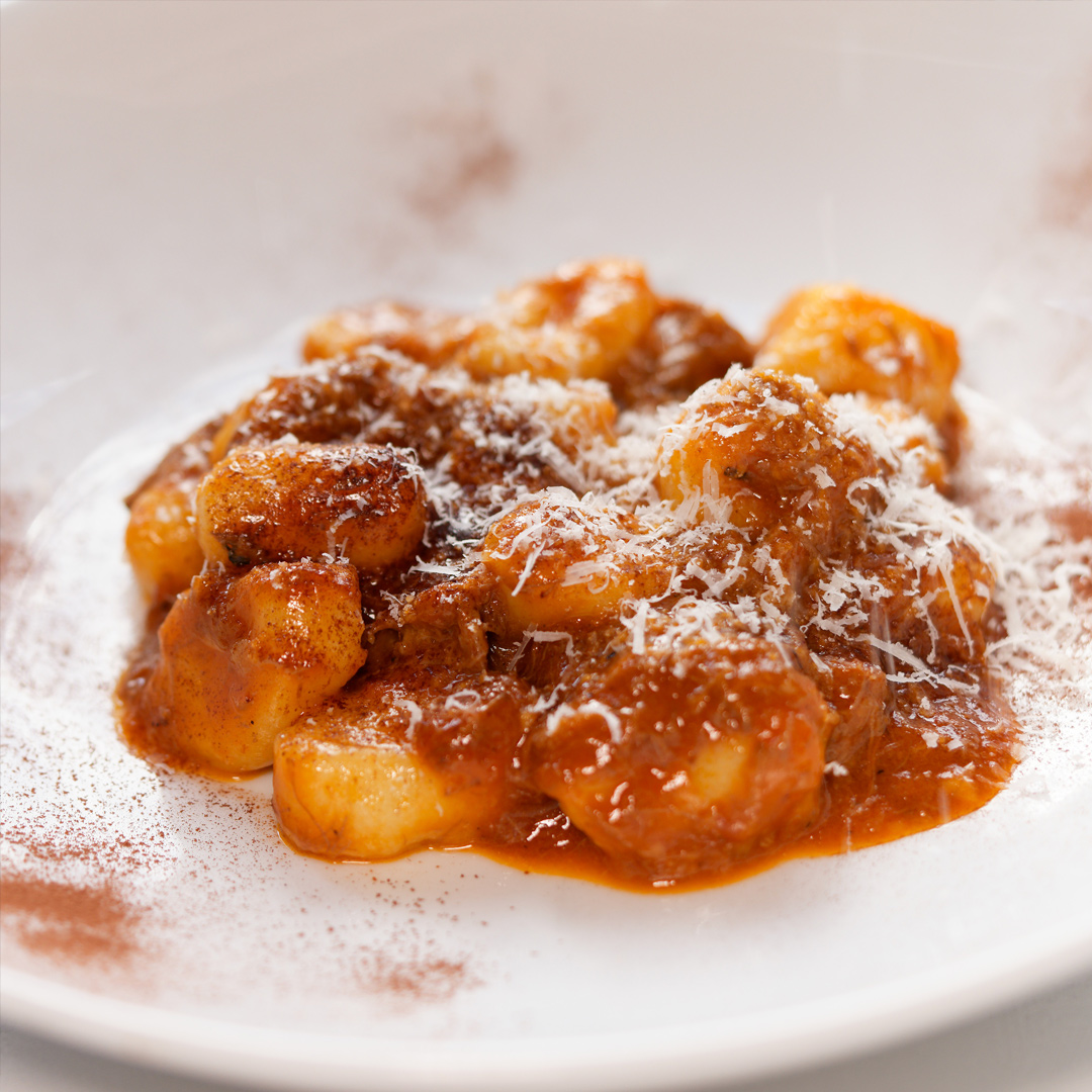 BUON RICORDO GNOCCHI ALLA VACCINARA Fresh made gnocchi served with Oxtail ragu and a touch of cinnamon.