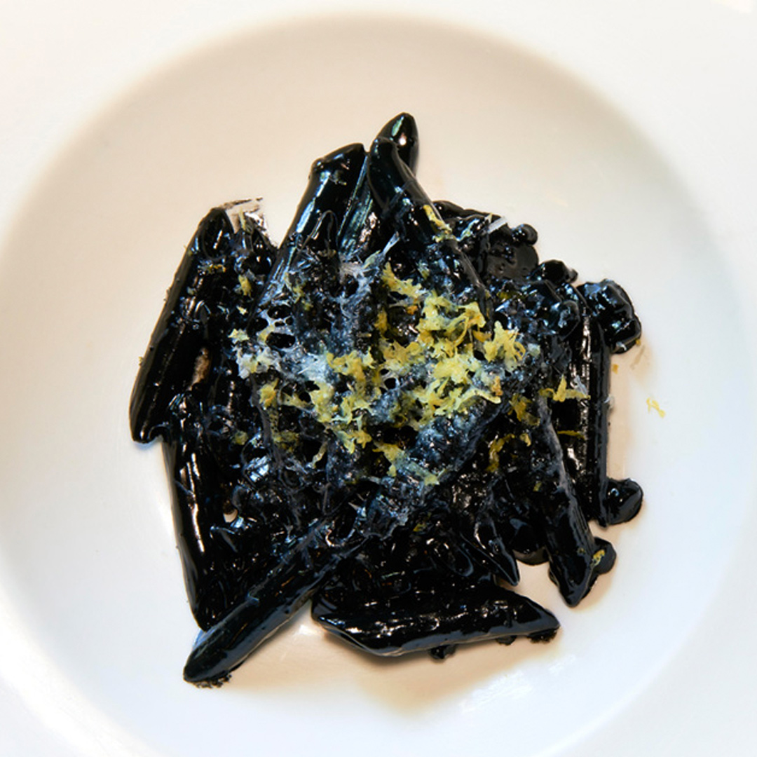 PASTA ‘AL DINTE’ Penne served with a cuttlefish ink sauce, braised cuttlefish, lemon zest and Pecorino.